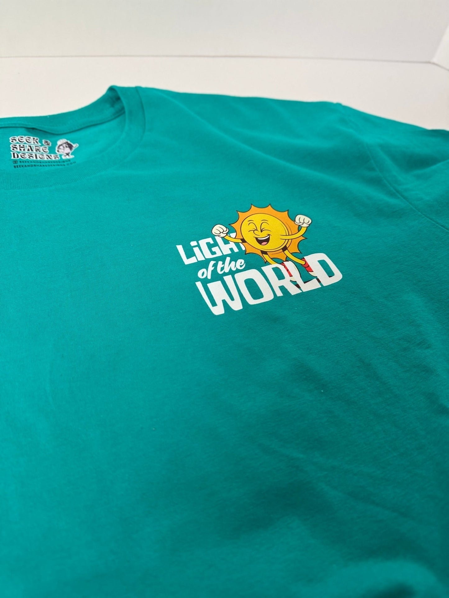 Light of the World Unisex Tee - Seek and Share Designs